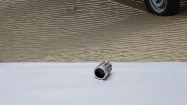 Nåleleje til øverste aksel