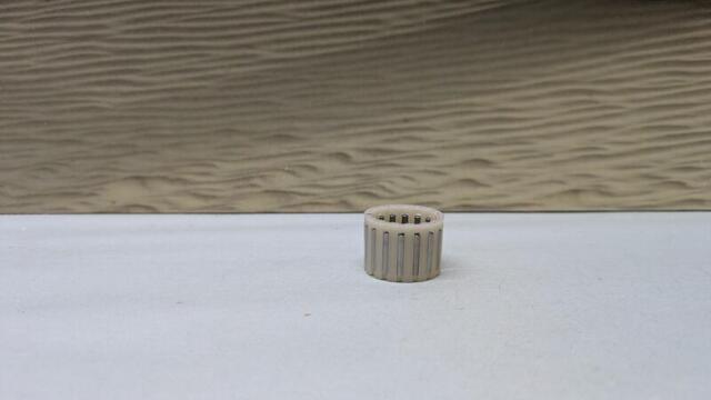 Nålejeleje til nederste omløber-aksel, bag